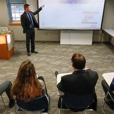 student teaching others in classroom